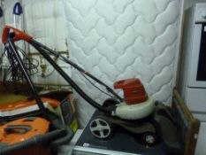 AN ECKMAN ELECTRIC LEAF VACUUM