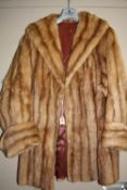 A 3/4 LENGTH FUR COAT