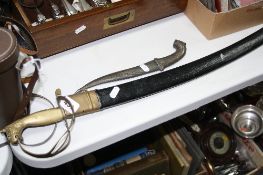 AN INDIAN SWORD AND SCABBARD, and a dagger (2)