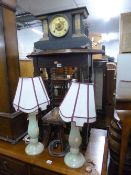 AN OAK OCCASIONAL TABLE, a pair of table lamps with shades, a mantel clock, a small stool and a