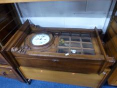 A CARVED OAK FRENCH WALL CLOCK, (key and pendulum)