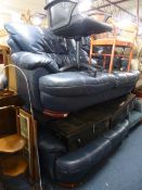 A LEATHER TWO PIECE SUITE, comprising of two three seater settees