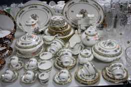 A COALPORT 'MING ROSE' PATTERN DINNER SERVICE, (over 65 pieces)
