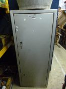 A LARGE METAL GUN CABINET, with space for fifteen guns (three keys)