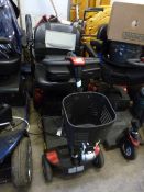 A GO-GO FOUR WHEELED MOBILITY SCOOTER (spares and repairs) (key and charger present)
