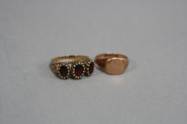TWO RINGS, to include a one 9ct gold three stone garnet ring, ring size P, hallmarked 9ct gold,
