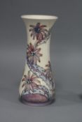 A MOORCROFT POTTERY VASE, pink/blue Cornflower pattern on cream ground, impressed and painted