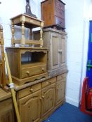 A PINE SIDEBOARD, a pine two door cabinet, TV cabinet, bedside chest, an occasional table, etc (