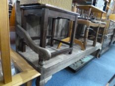 AN OAK HALL SETTLE/BENCH, with panelled back (in need of restoration)