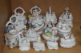 FOURTEEN VARIOUS FAIRING TRINKET BOXES, in the form of fireplaces, piano, a hand, tables etc, height