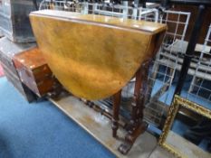 A VICTORIAN WALNUT SUTHERLAND TABLE, with pierced end supports, approximate size extended length