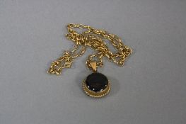 A LATE 20TH CENTURY 9CT GOLD BLACK STAR DIOPSIDE SINGLE STONE PENDANT, round cabachon cut star