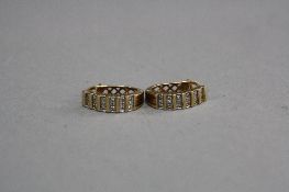 A 9CT SOLID DIAMOND SET EARRINGS