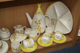CARLTONWARE TEASET, decorated with yellow flowers on cream ground (17)