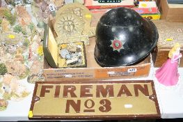 A DERBYSHIRE FIRE SERVICE HELMET, 'Firemans No.3', cast wall plaque, various badges, medallions etc,
