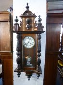 A VICTORIAN WALL CLOCK (key and pendulum) (sd)