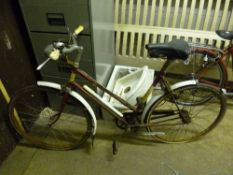 A VINTAGE RUNWELL LADIES BICYCLE