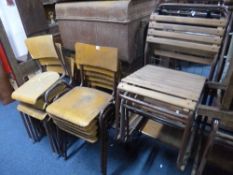 TEN TUBULAR METAL STACKING CHAIRS, with plywood seats and backrests and eight tubular metal stacking