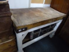 A LATE 19TH CENTURY BUTCHERS BLOCK, on a separate painted base, approximate size depth 122cm x width