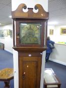 AN OAK AND MAHOGANY CASED LONGCASE CLOCK, thirty hour movement, 11' square brass face with pierced