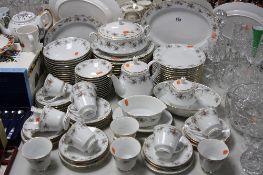 A NORITAKE 'LEGENDARY - SECRET LOVE' PATTERN COMPREHENSIVE DINNER SERVICE, including tureens and