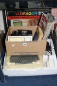 A DRAGON 32 VINTAGE COMPUTER SYSTEM, in its original box, complete with two joy sticks, PSU, manual,
