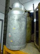 TWO MILK CHURNS, (one missing lid) and a painted cast iron bedroom fireplace (3)