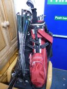 A COLLECTION OF GOLFING EQUIPMENT, to include two golf bags, sets of clubs including tailor made,