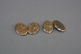 AN EARLY 20TH CENTURY PAIR OF 9CT GOLD CUFFLINKS, oval shape fully engraved in a floral and