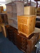 AN OPEN BOOKCASE, an oak hanging bookcase and a pine bedside chest (3)