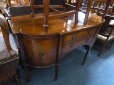 A MODERN MAHOGANY SIDEBOARD, with two central drawers flanked by cupboards