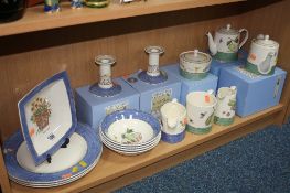 WEDGWOOD 'SARAH'S GARDEN', to include two boxed small teapots, a pair of candlesticks, boxed covered