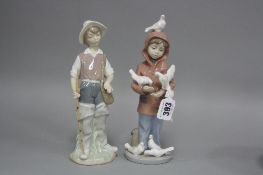 TWO LLADRO FIGURES, boy with birds, No.6129 and boy with fishing rod and basket (2)