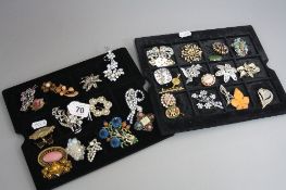 TWO TRAYS OF BROOCHES