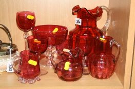 A GROUP OF RUBY/RED COLOURED GLASSWARES, (9)