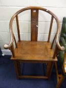 A MODERN CHINESE CARVED HARDWOOD ARMCHAIR