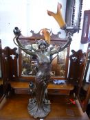 A THREE BRANCH FIGURAL LAMP, modelled as scantily clad Art Nouveau maiden with naturalistic