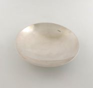 By H. Atkins, a silver Art Deco dish, Sheffield 1937, plain shallow circular form, on a tapering