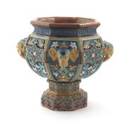 A Doulton Lambeth Indian Vase jardiniere and stand, octagonal form cast in low relief with panels of