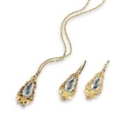A pair of early 20th century pear shaped aquamarine mounted gold earrings, floral cannetille