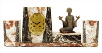 A French Art Deco Clock Garniture, striking movement stamped `Fini, Paris`, gilt octagonal dial