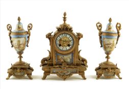 A French porcelain mounted gilt metal clock garniture, striking movement by Ad. Mongin, numbered