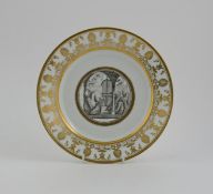 A Paris porcelain humorous cabinet plate, 19th century, the well decorated with a scene of nuns