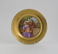 A Paris porcelain cabinet plate, 19th century, depicting the Biblical family with the infant Jesus
