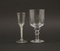A large glass goblet and an 18th century style glass, modern, both by Peter David, the goblet