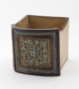 A Doulton Lambeth stoneware planter, square section, cast in low relief with geometric foliage