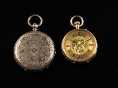 A Swiss 14k gold keyless cylinder lady`s watch, engraved gilt dial in a florally engraved case, 33mm