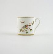 A rare Nantgarw coffee can, c.1818-20, painted by Thomas Pardoe with a songbird perched on a berried