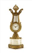 A French gilt brass and marble mantel timepiece, circular white enamel dial, drum movement with