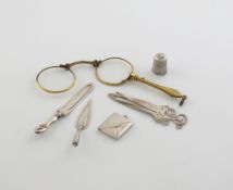 A mixed lot, comprising silver items: an envelope stamp case, Chester 1907, a trowel book mark,
